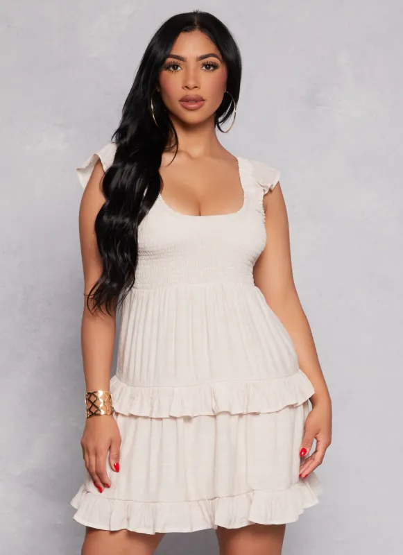 Almost Famous Flutter Sleeve Smocked Tiered Dress sold by Rainbow