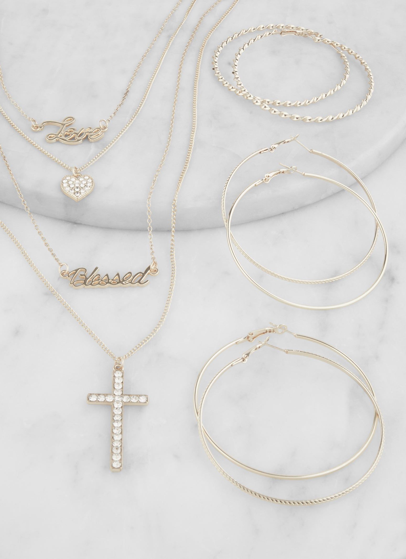 Rhinestone Cross Layered Chain Necklace and Hoop Earrings sold by Rainbow