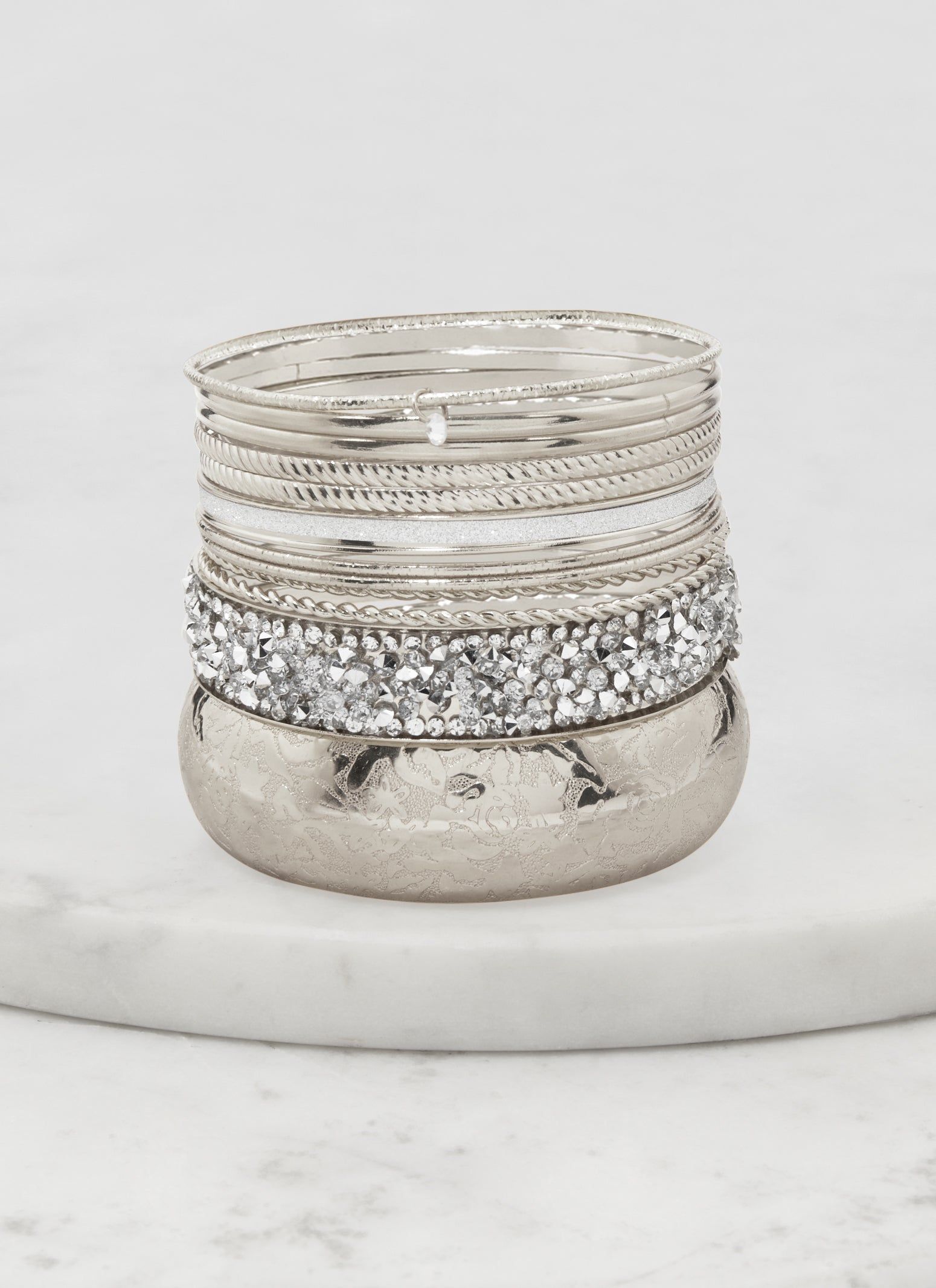 Set of 12 Cubic Zirconia Textured Metallic Bangles sold by Rainbow