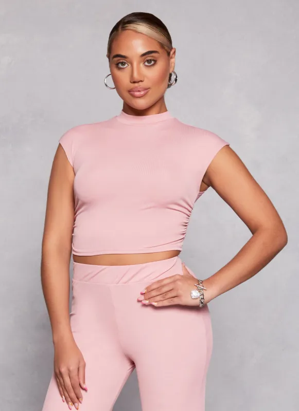 Ruched Mock Neck Cap Sleeve Top sold by Rainbow
