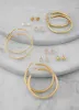 Assorted Cubic Zirconia Stud and Hoop Earring Set of 9 sold by Rainbow