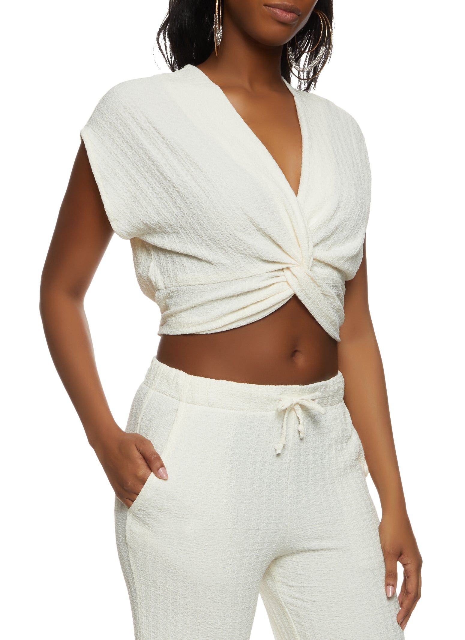 Textured Knit Twist Front Top sold by Rainbow