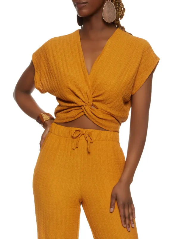 Textured Knit Twist Front Top sold by Rainbow