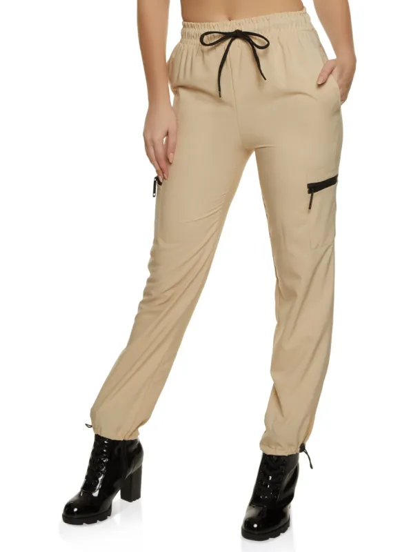 Solid Zip Pocket Parachute Joggers sold by Rainbow