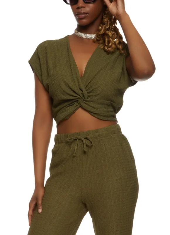 Textured Knit Twist Front Top sold by Rainbow