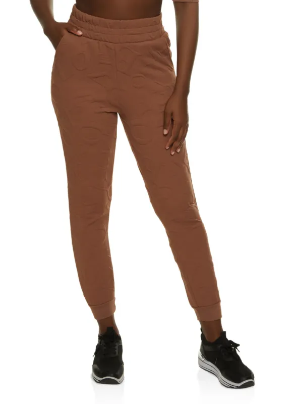 Love Embossed Joggers sold by Rainbow