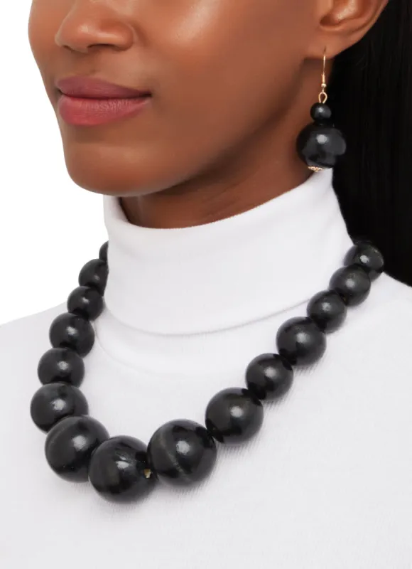 Wooden Beaded Necklace and Drop Earrings sold by Rainbow