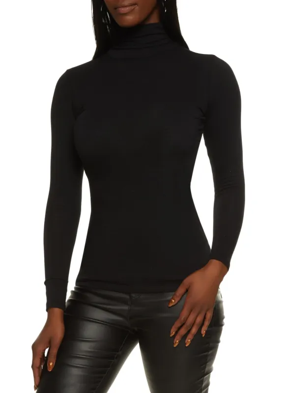 Solid Long Sleeve Turtleneck Top sold by Rainbow