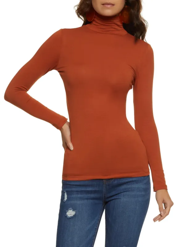 Solid Long Sleeve Turtleneck Top sold by Rainbow