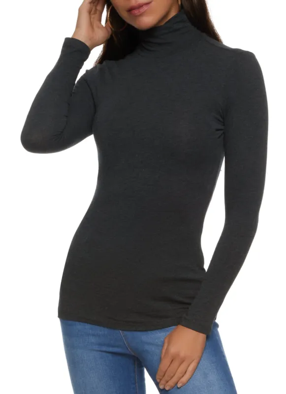 Solid Long Sleeve Turtleneck Top sold by Rainbow