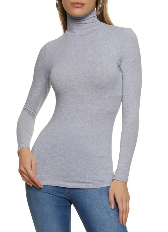 Solid Long Sleeve Turtleneck Top sold by Rainbow