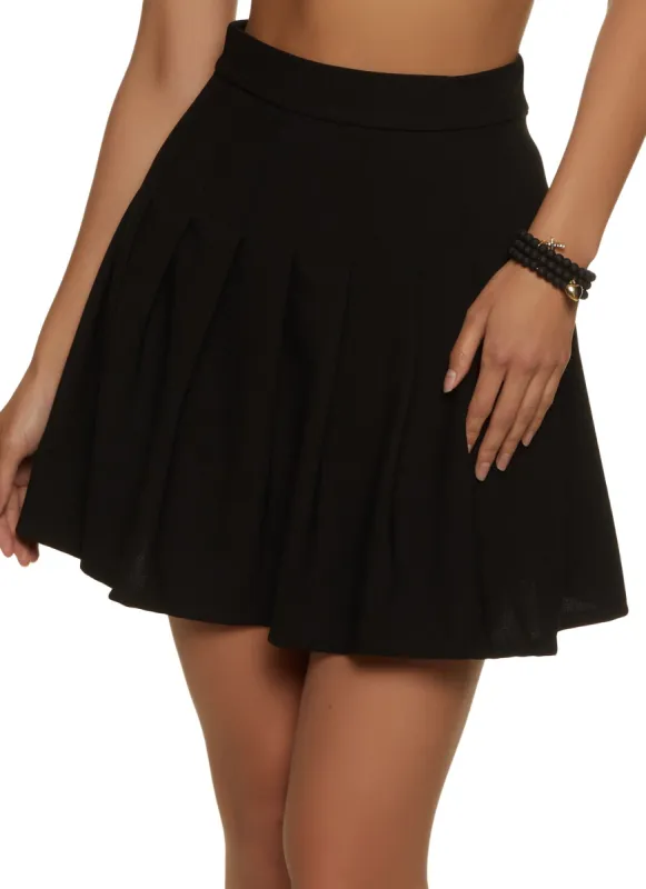 Solid Pleated Mini Skirt sold by Rainbow