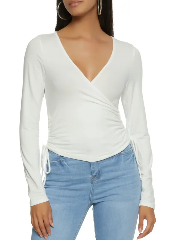 Solid Ruched Long Sleeve Wrap Top sold by Rainbow