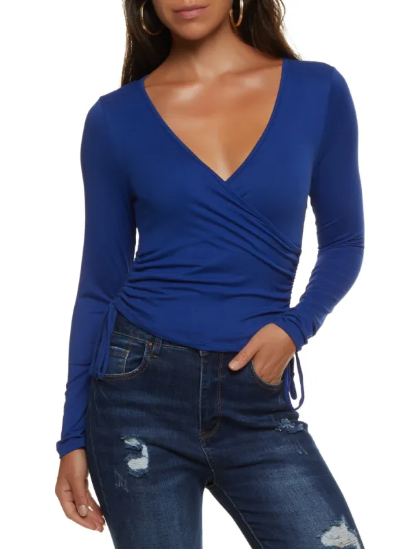Solid Ruched Long Sleeve Wrap Top sold by Rainbow