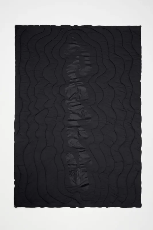Puffer Blanket made by Rains