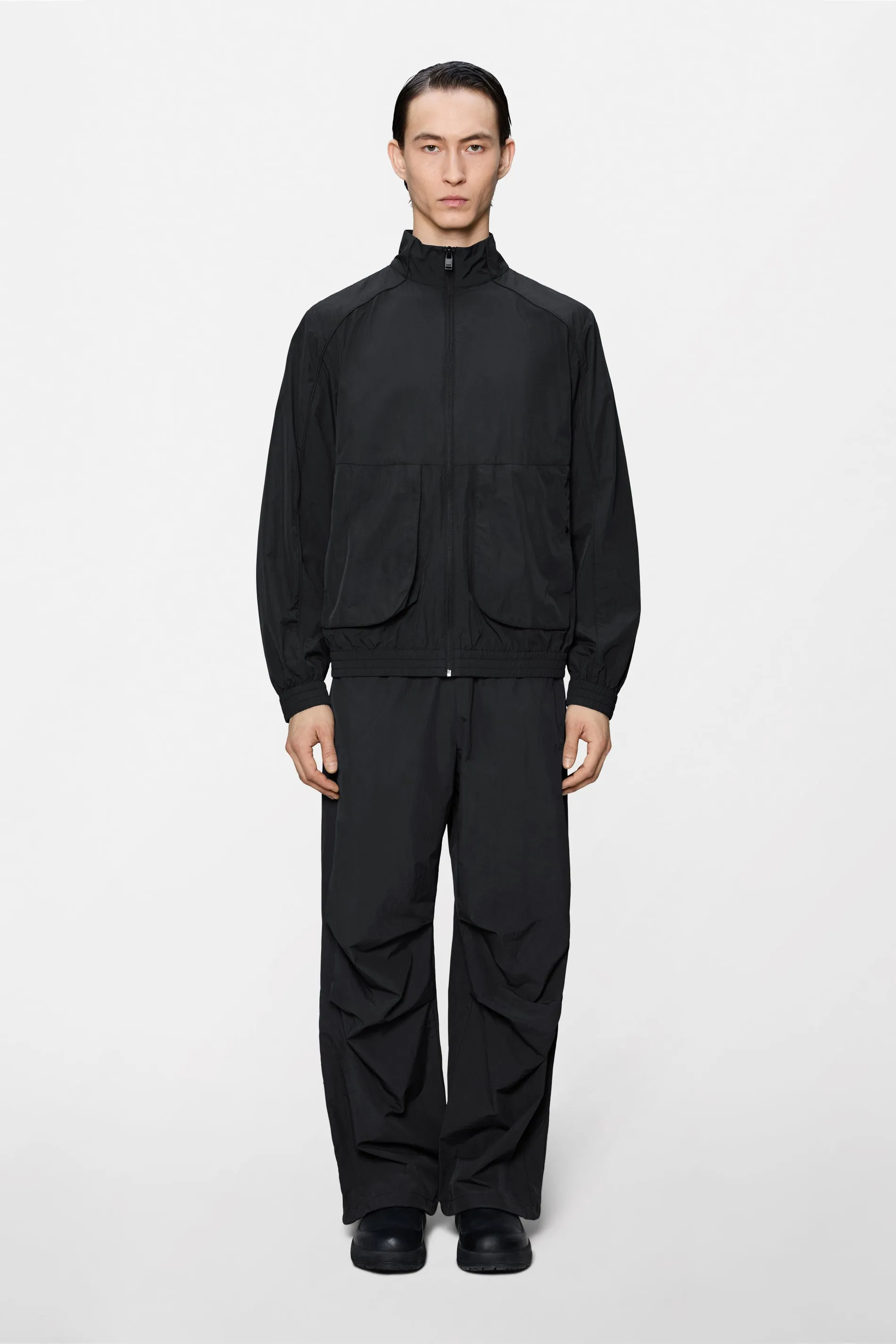 Cooldown Pocket Track Top sold by Rains