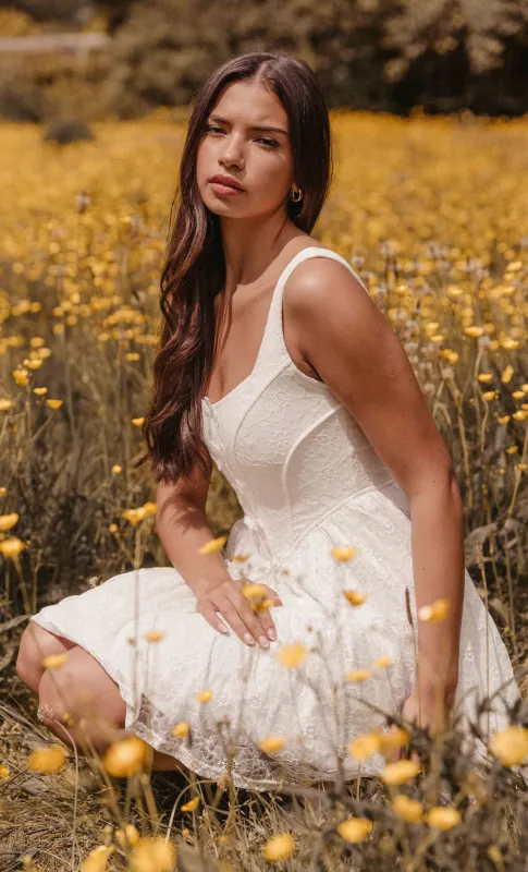 Ivory Tiered Corset Mini Dress sold by Rare London