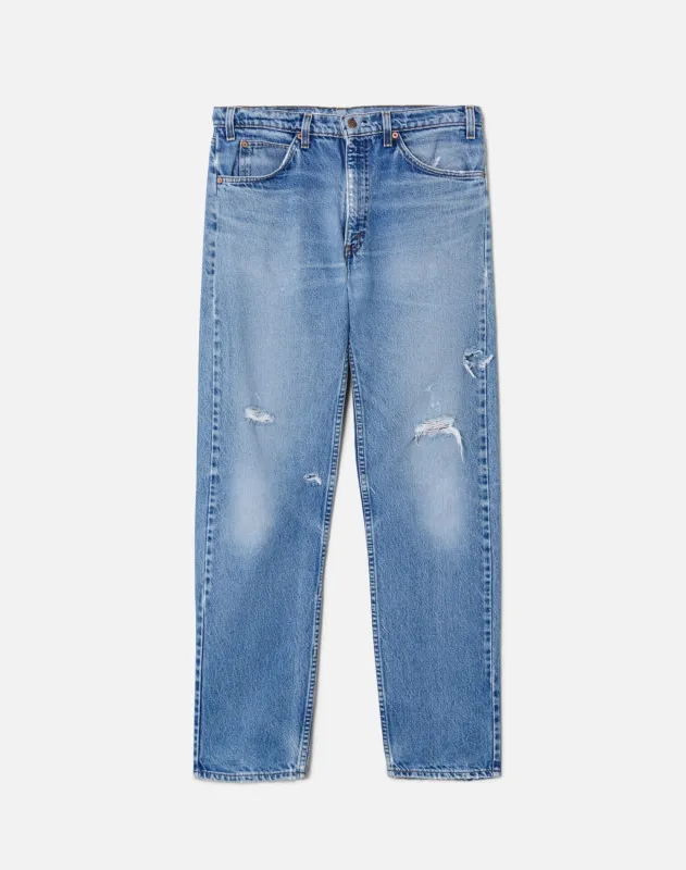 80s Distressed Orange Tab Levi's 505 sold by Re/Done