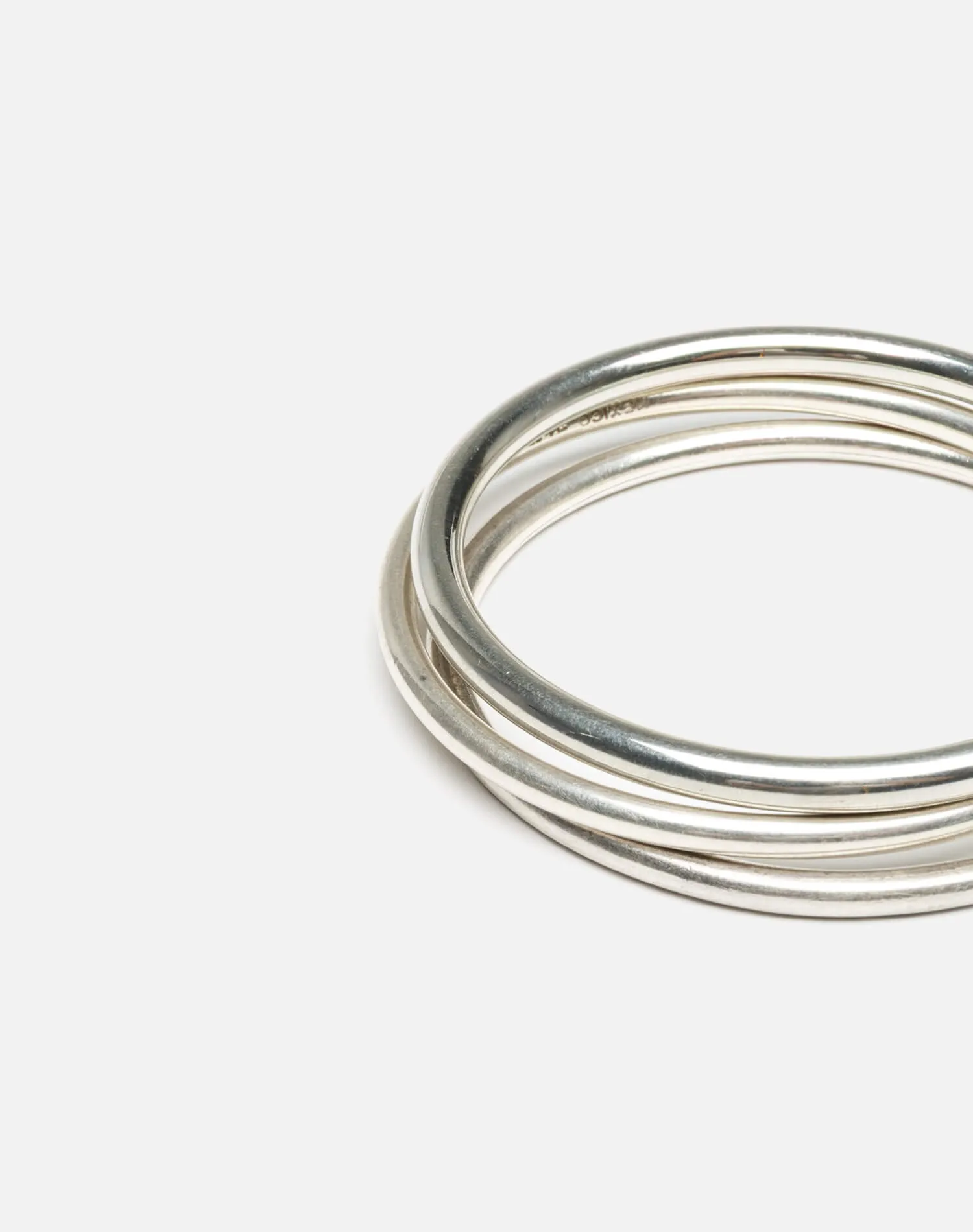 60s Sterling Tube Bangle Trio sold by Re/Done product image thumbnail 3