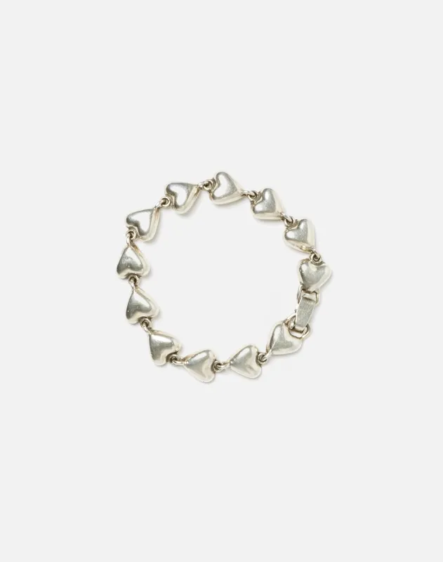 60s Sterling Puffy Heart Bracelet sold by Re/Done