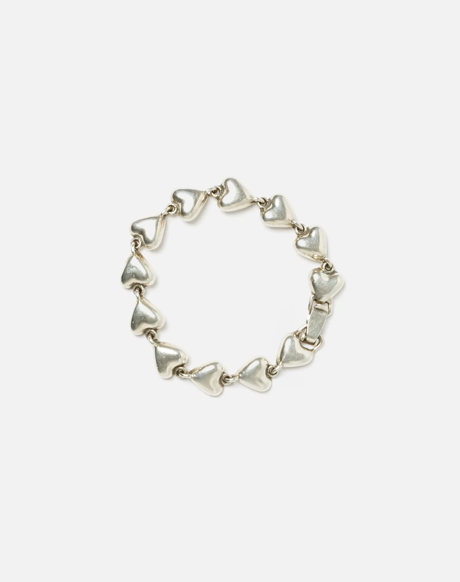 60s Sterling Puffy Heart Bracelet sold by Re/Done