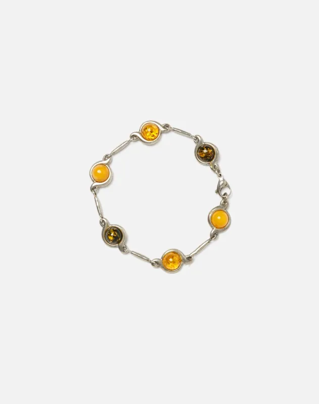 1900s Sterling and Amber Tennis Bracelet sold by Re/Done