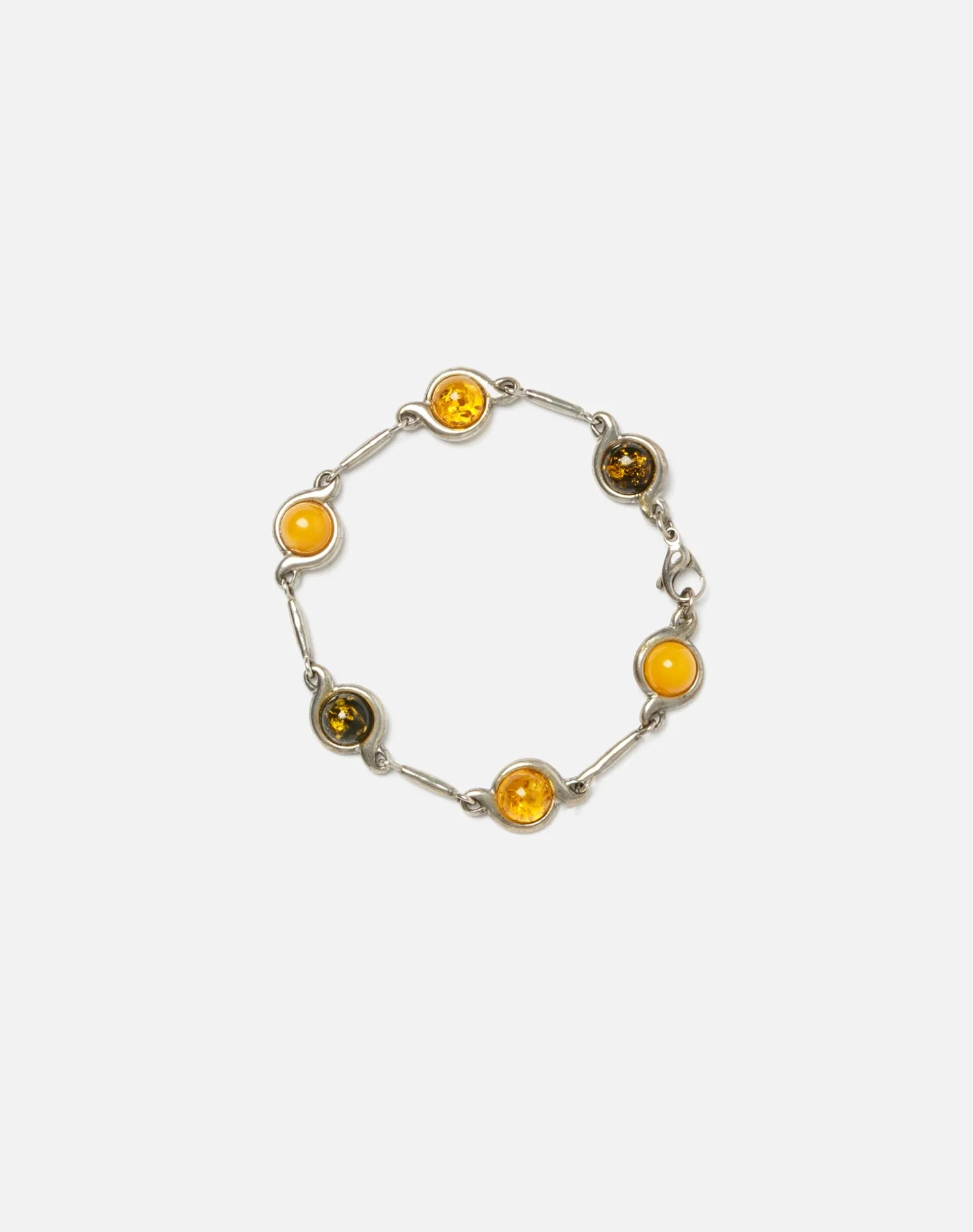 1900s Sterling and Amber Tennis Bracelet sold by Re/Done