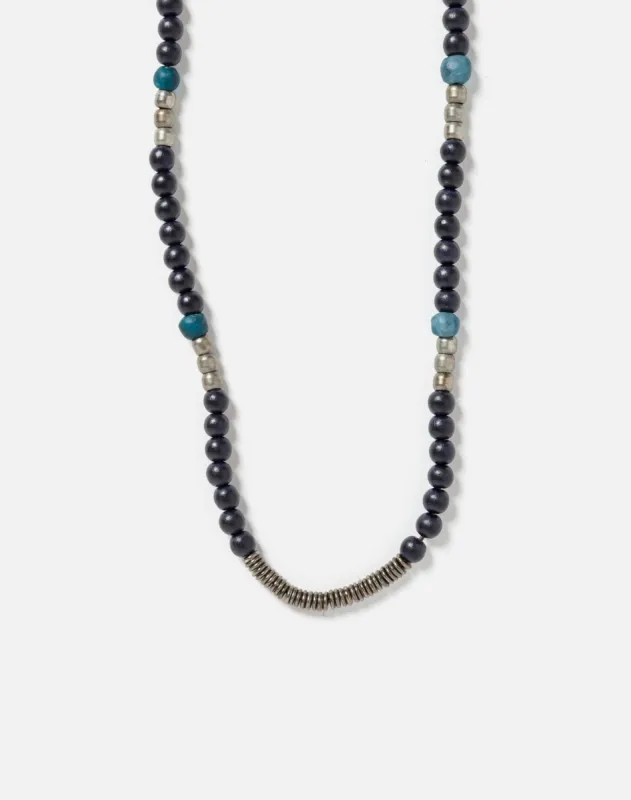 Silver And Wood Beads On Leather Cord sold by Re/Done
