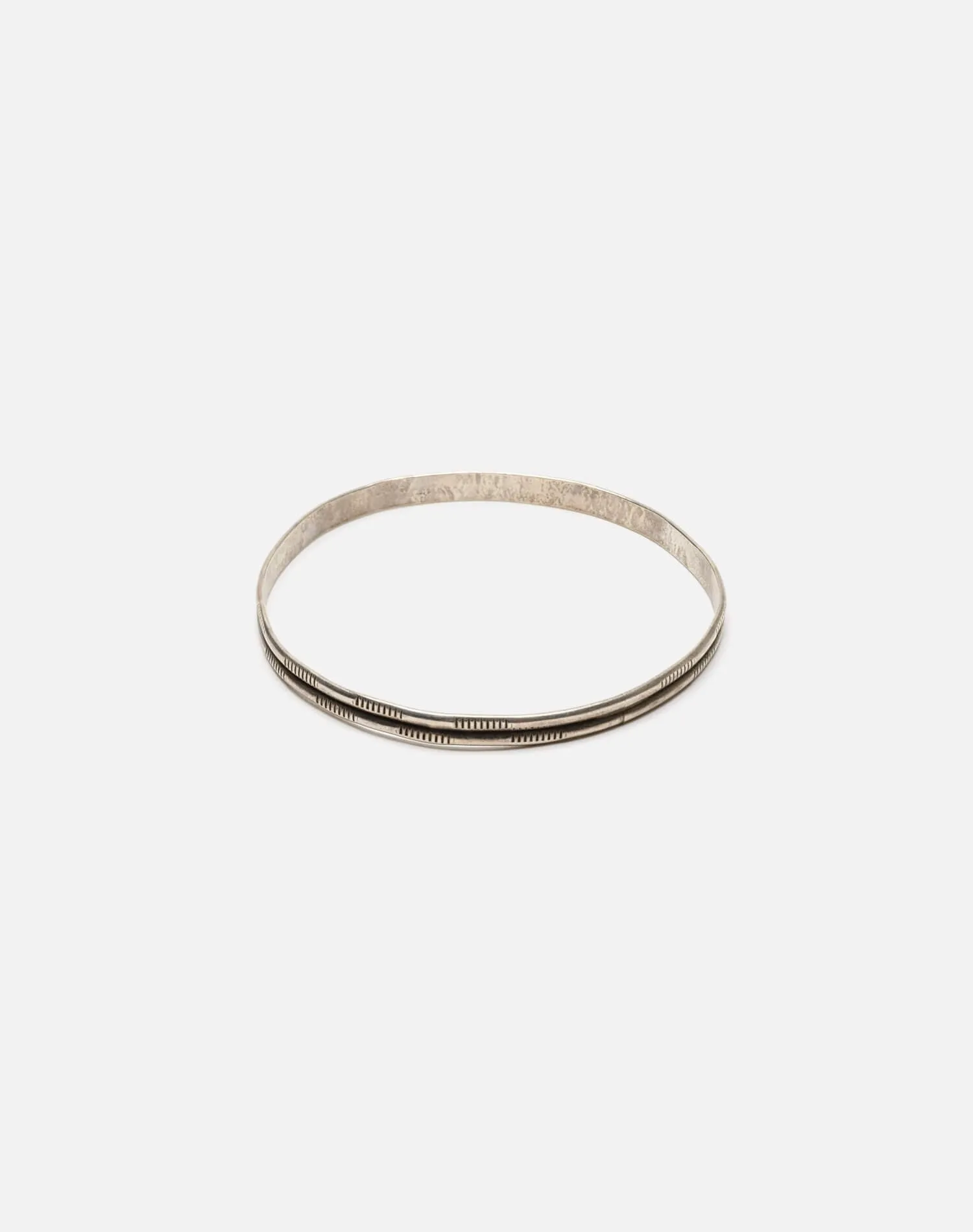 1940s Navajo Stamped Sterling Silver Bangle sold by Re/Done