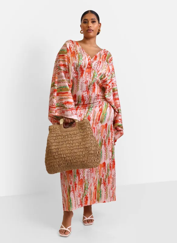 Oversized Straw Tote sold by Rebdolls