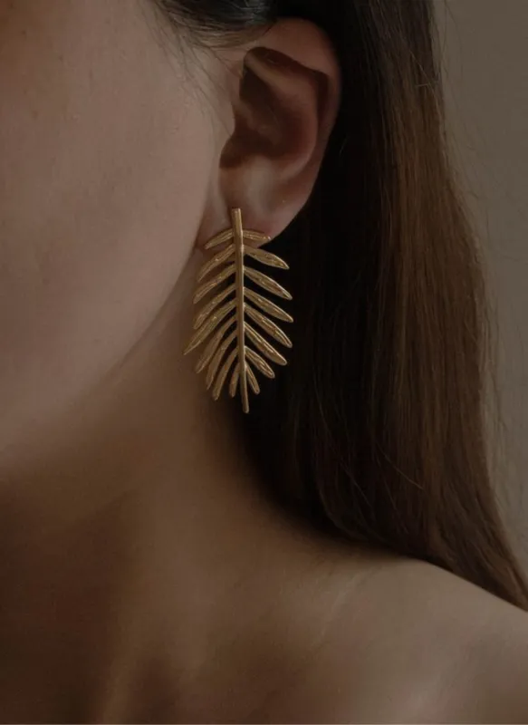 Palm Statement Earrings sold by Rebdolls