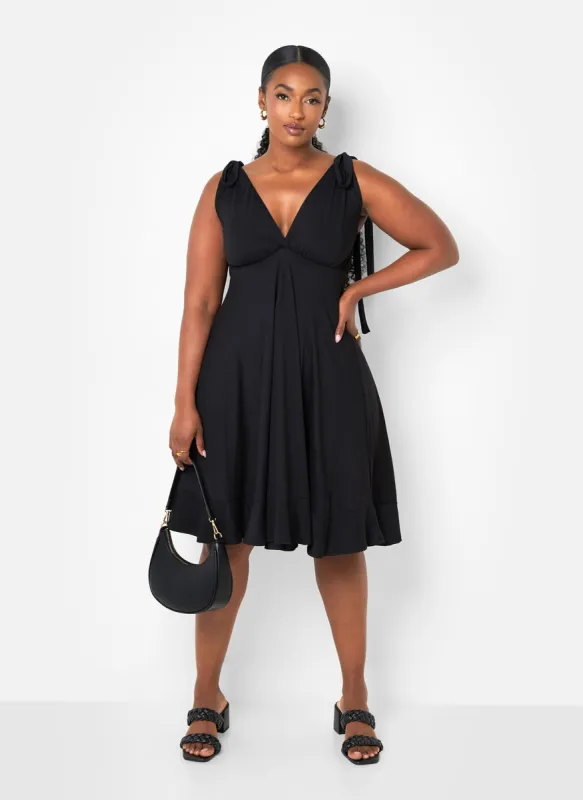 Blythe Tie Strap Ruffle Hem Mini Skater Dress - Black sold by Rebdolls
