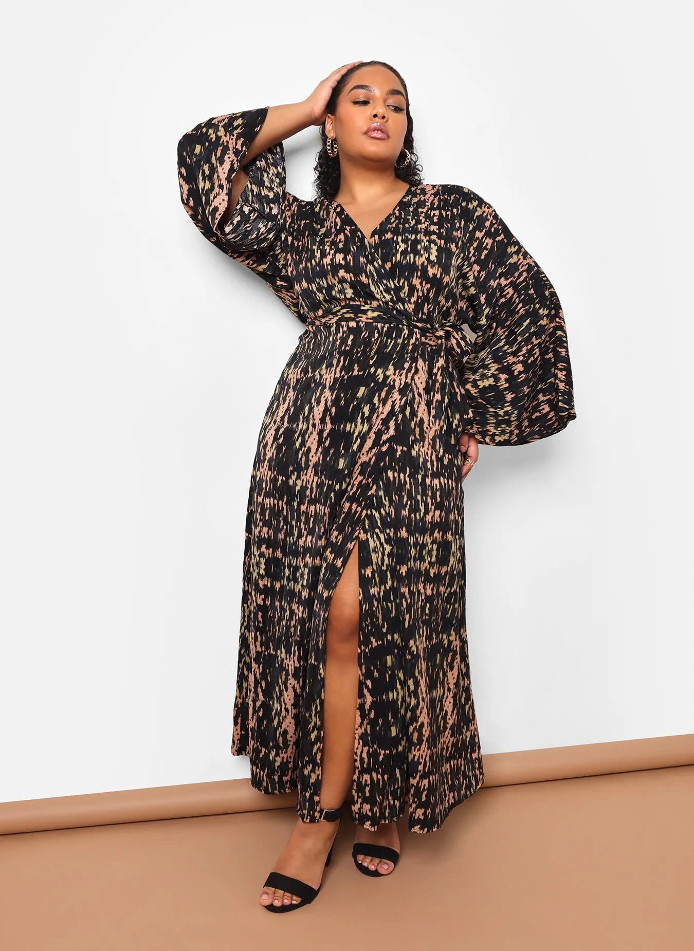 Ria Abstract Print Maxi Wrap Dress sold by Rebdolls