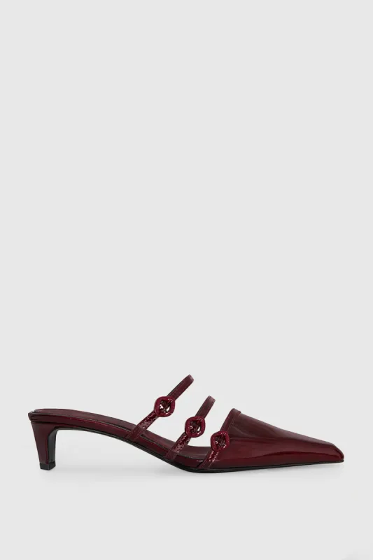 Buckle Kitten Mule sold by Rebecca Minkoff