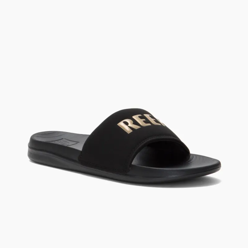 Reef Women REEF ONE SLIDE BLACK/GOLD sold by Reef
