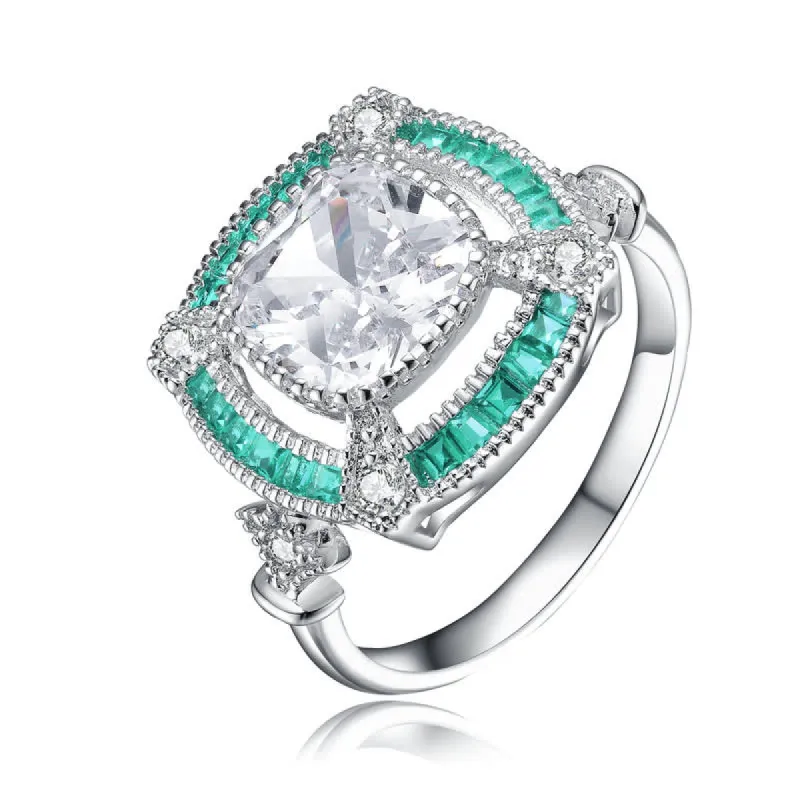 Genevive Sterling Silver White Gold Plated with Pear and Round Colored Cubic Zirconia Cocktail Ring Size 7 sold by Reitmans