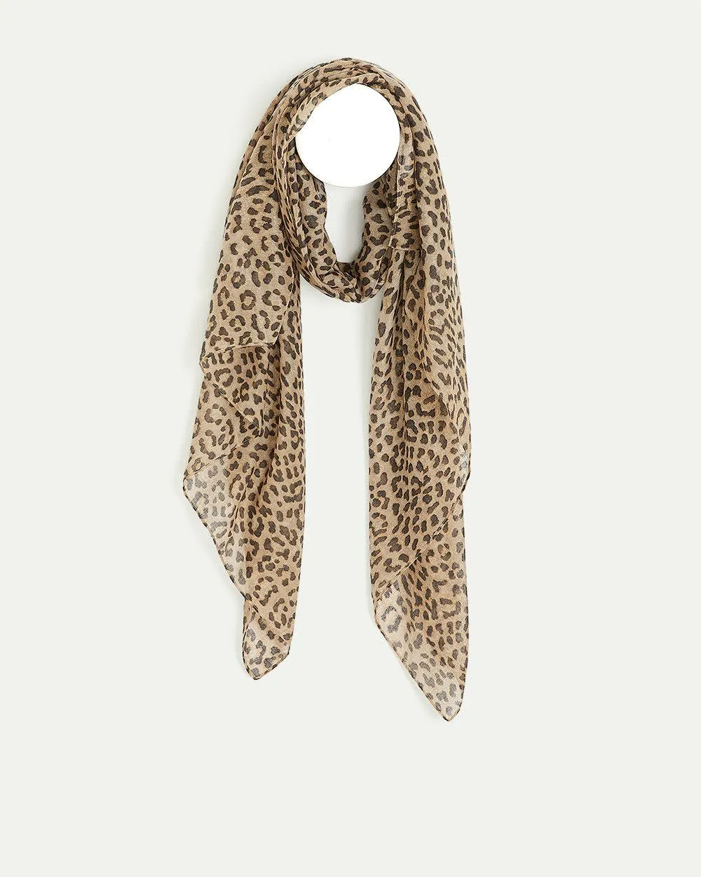 Scarf with Cheetah Print sold by Reitmans