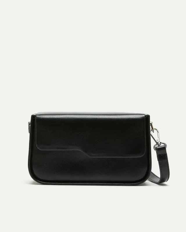 Faux Leather Cross-Body Bag sold by Reitmans