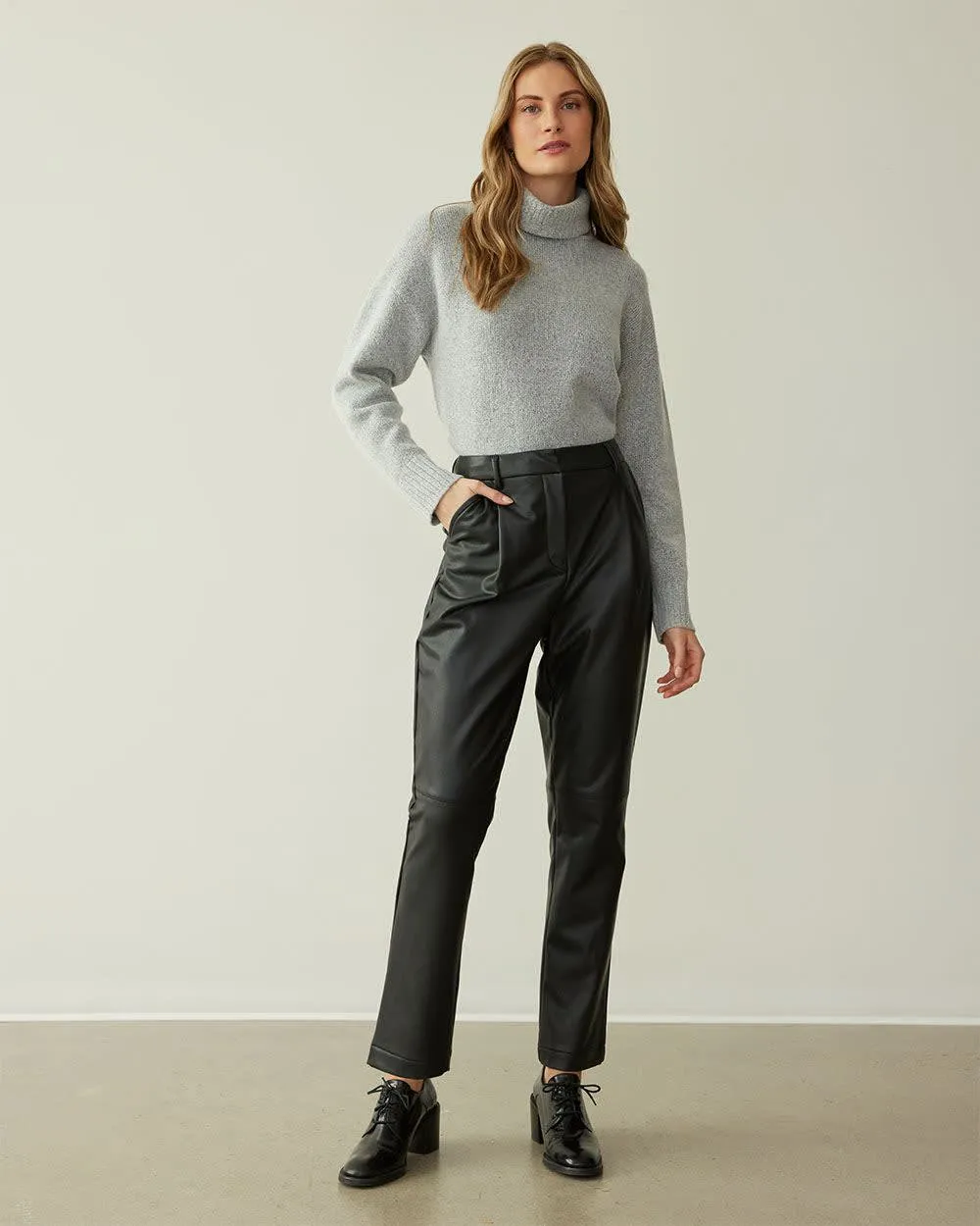 Tapered-Leg Faux Leather Pants sold by Reitmans
