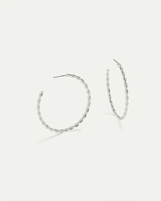 Large Twisted Open Hoops sold by Reitmans