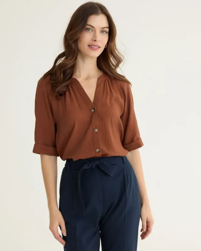 Short-Sleeve Buttoned-Down Blouse with Split Neckline sold by Reitmans