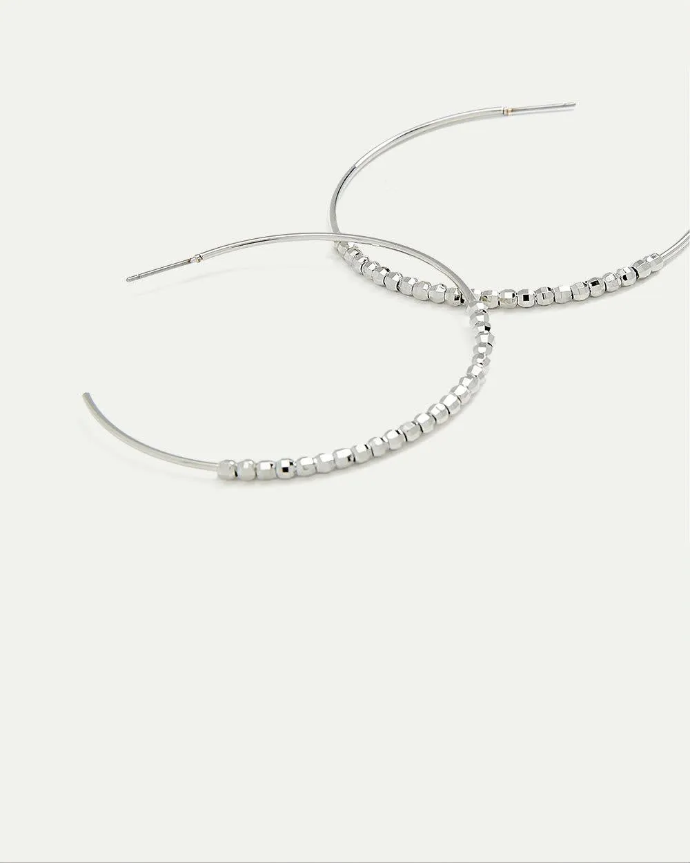 Hoops with Station Beads sold by Reitmans