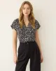 Short-Sleeve V-Neck Blouse sold by Reitmans