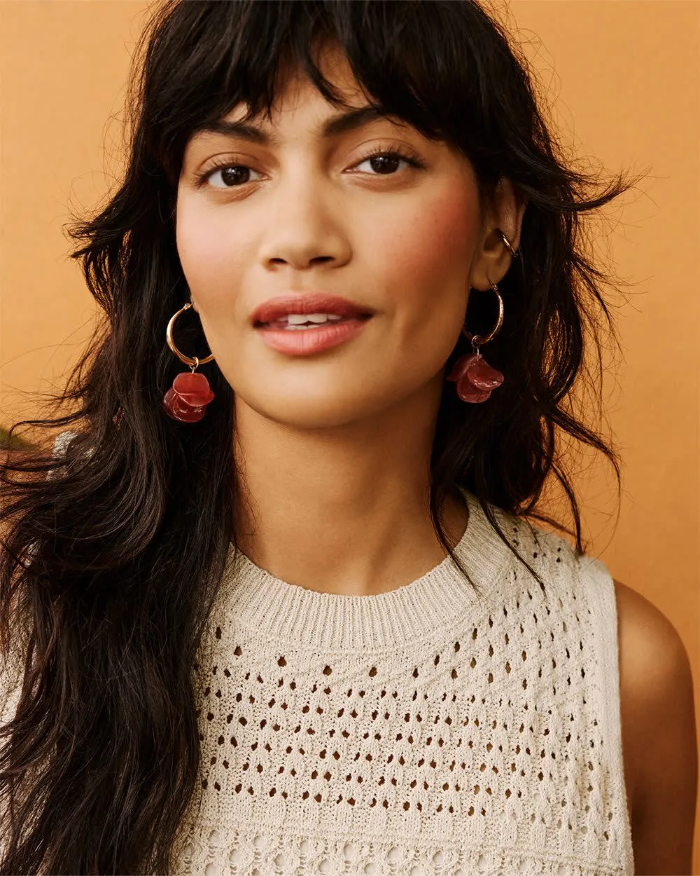 Hoops with Petal Clusters sold by Reitmans