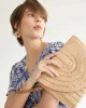 Straw Clutch with Wristlet sold by Reitmans