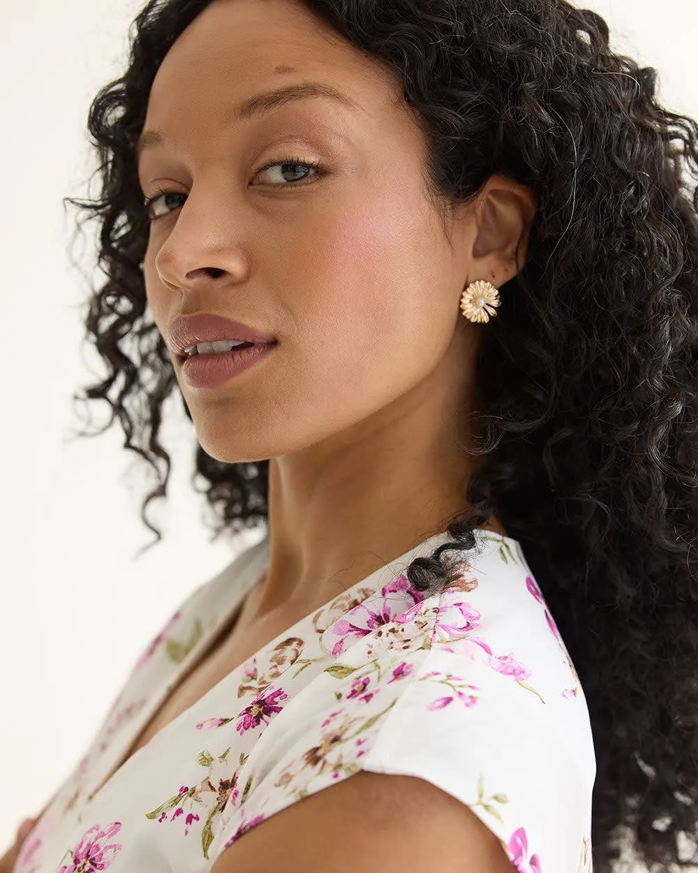 Daisy Earrings with Pearls sold by Reitmans