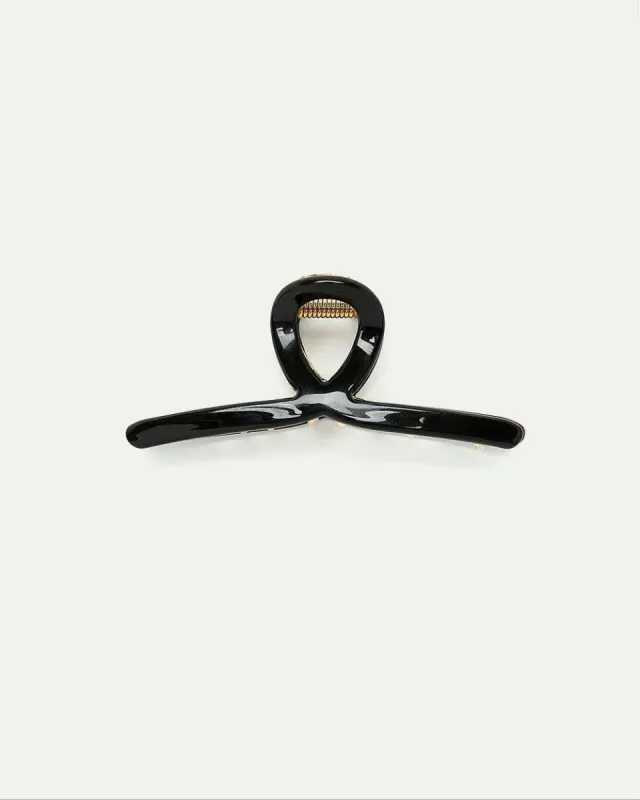 Small Lacquered Metal Claw Clip sold by Reitmans