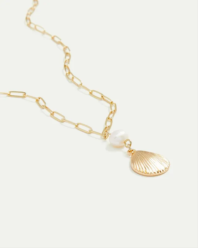 Long Necklace with Sea Shell Pendant sold by Reitmans