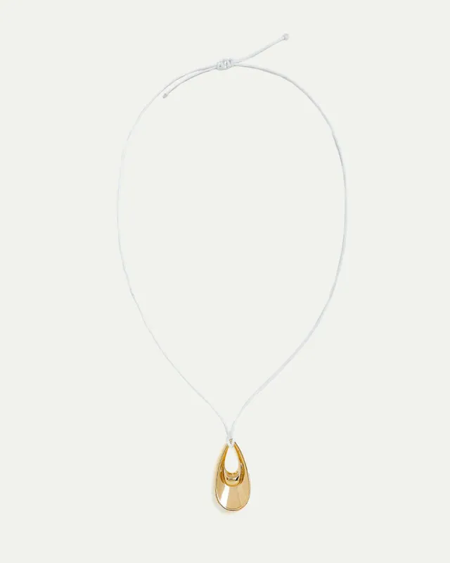 Short Cord Necklace with Elongated Pendant sold by Reitmans