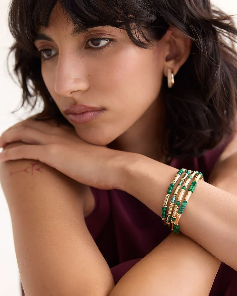 Elastic Bracelets with Malachite Beads - Set of 4 sold by Reitmans
